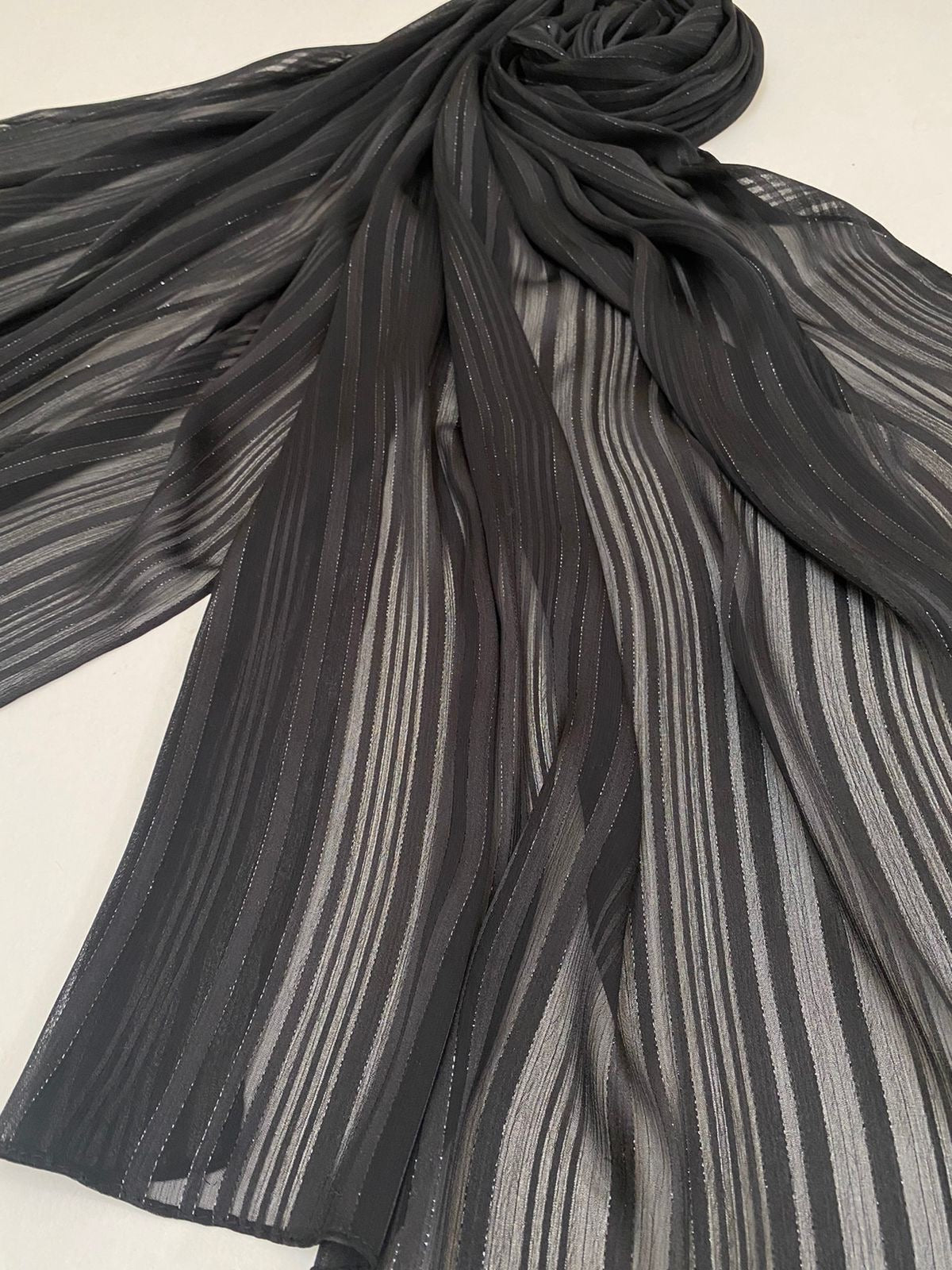 Black chiffon scarf.