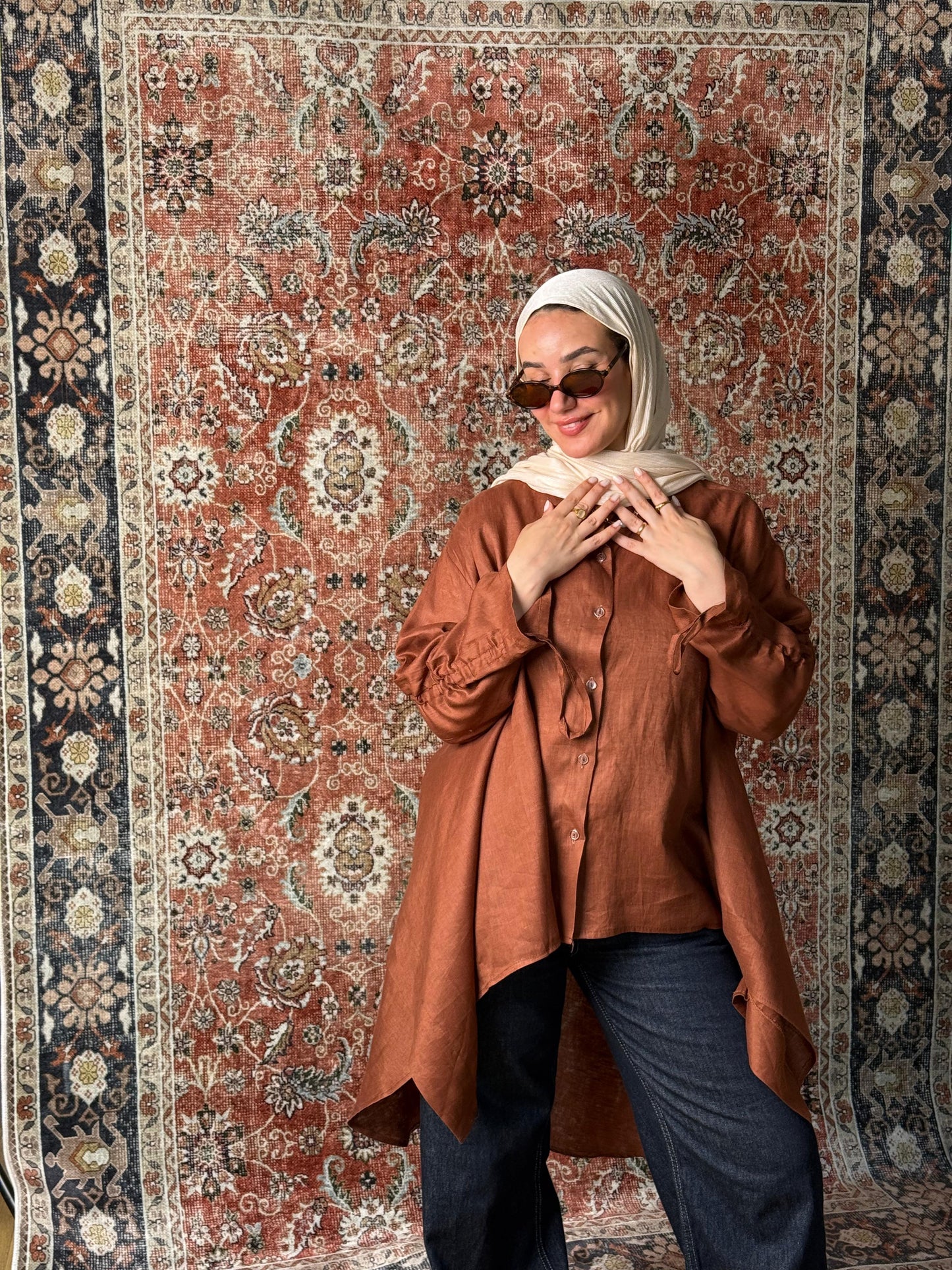 Maroon linen shirt.