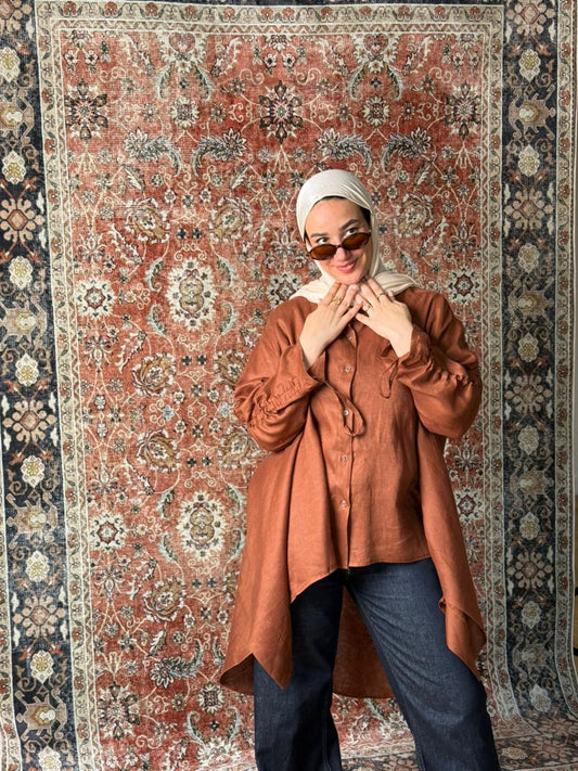 Maroon linen shirt.