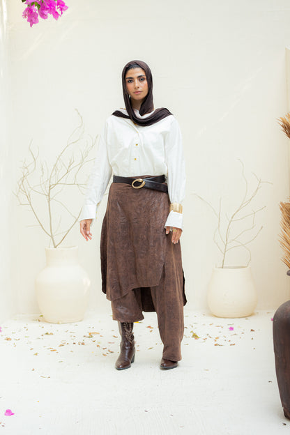 Crushed leather layered pants.