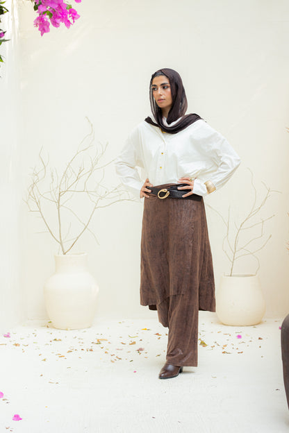 Crushed leather layered pants.