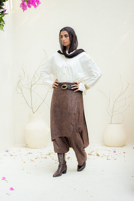 Crushed leather layered pants.