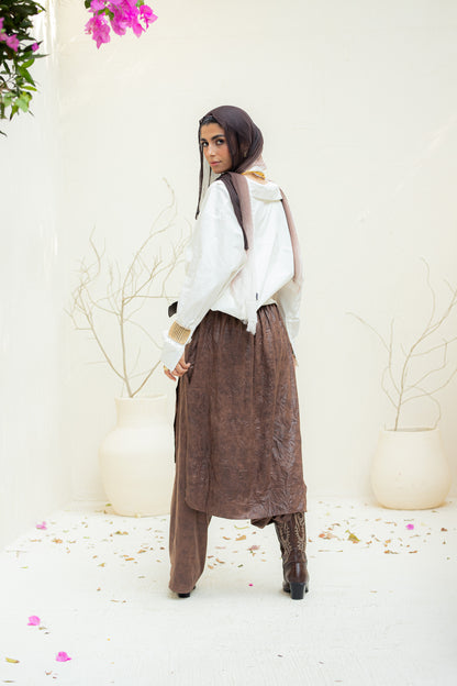 Crushed leather layered pants.