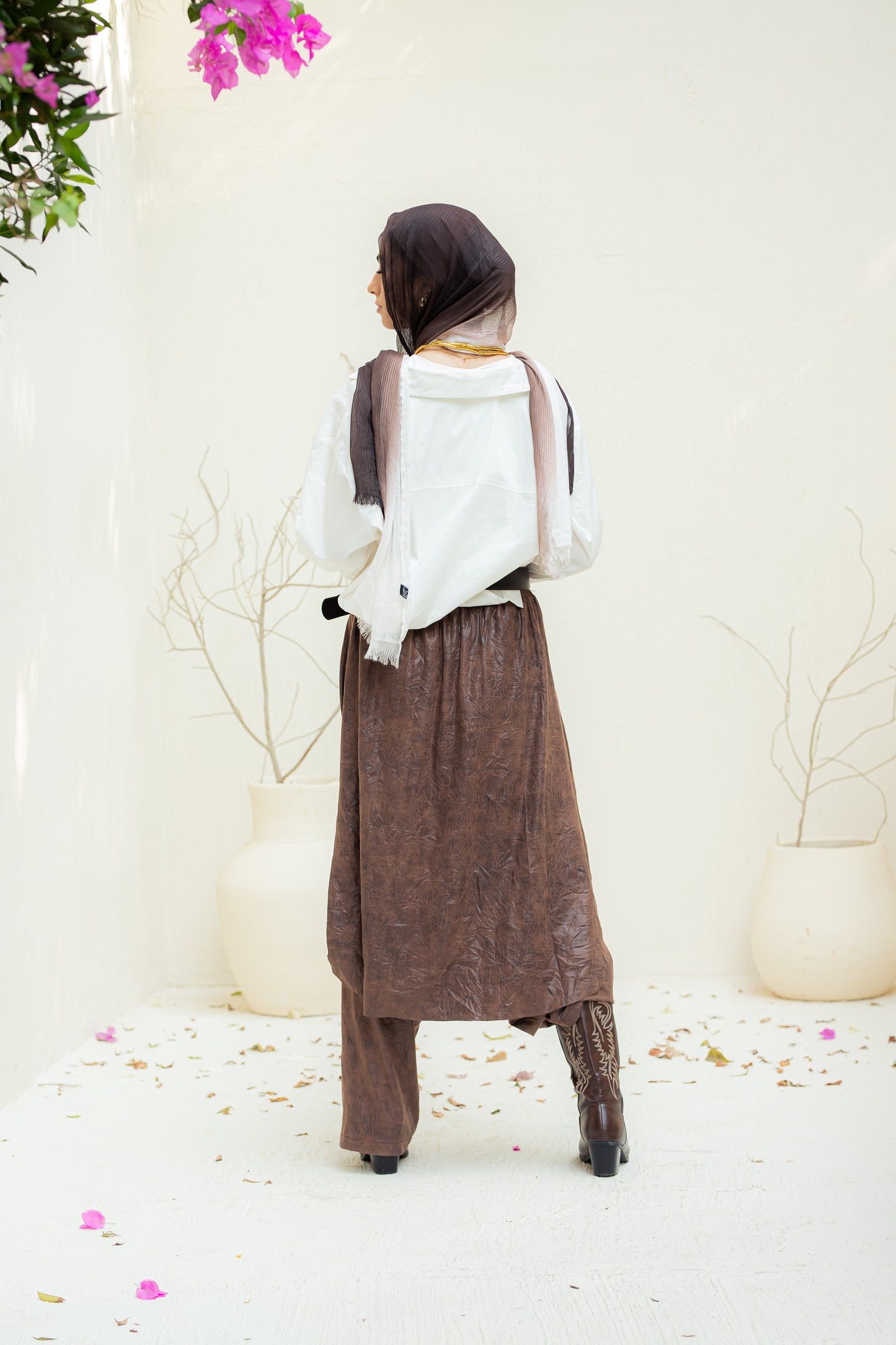 Crushed leather layered pants.