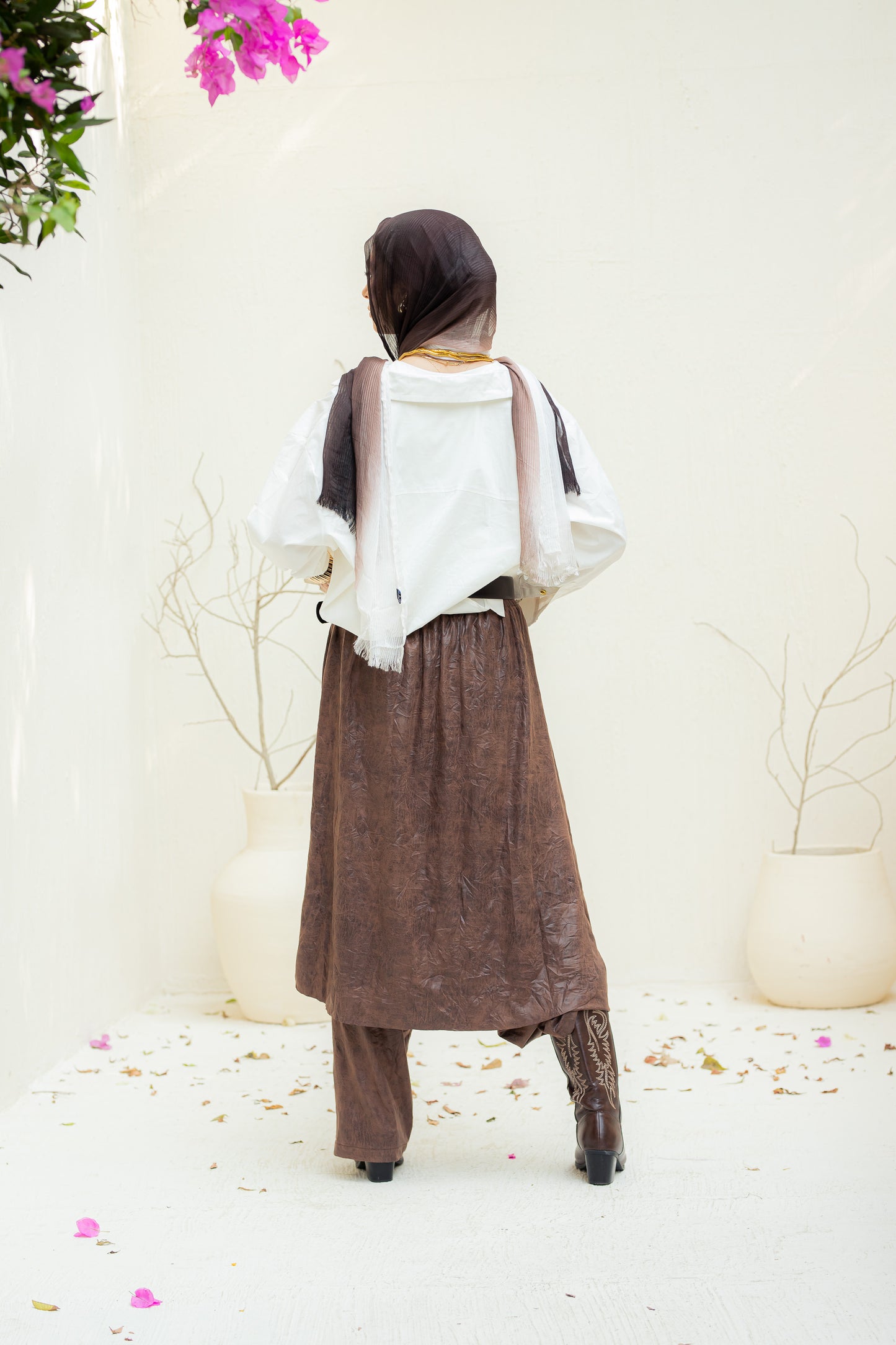 Crushed leather layered pants.