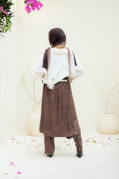 Crushed leather layered pants.