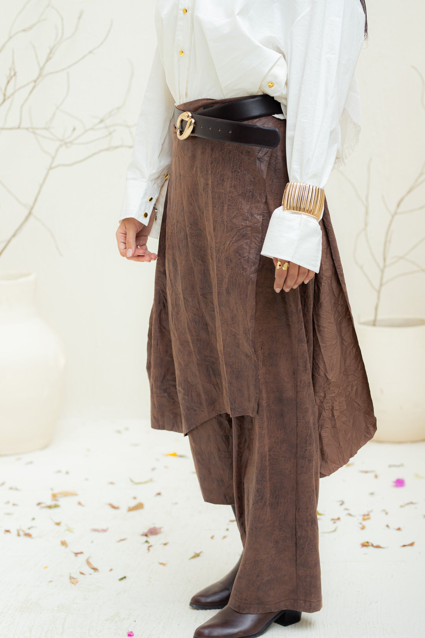 Crushed leather layered pants.